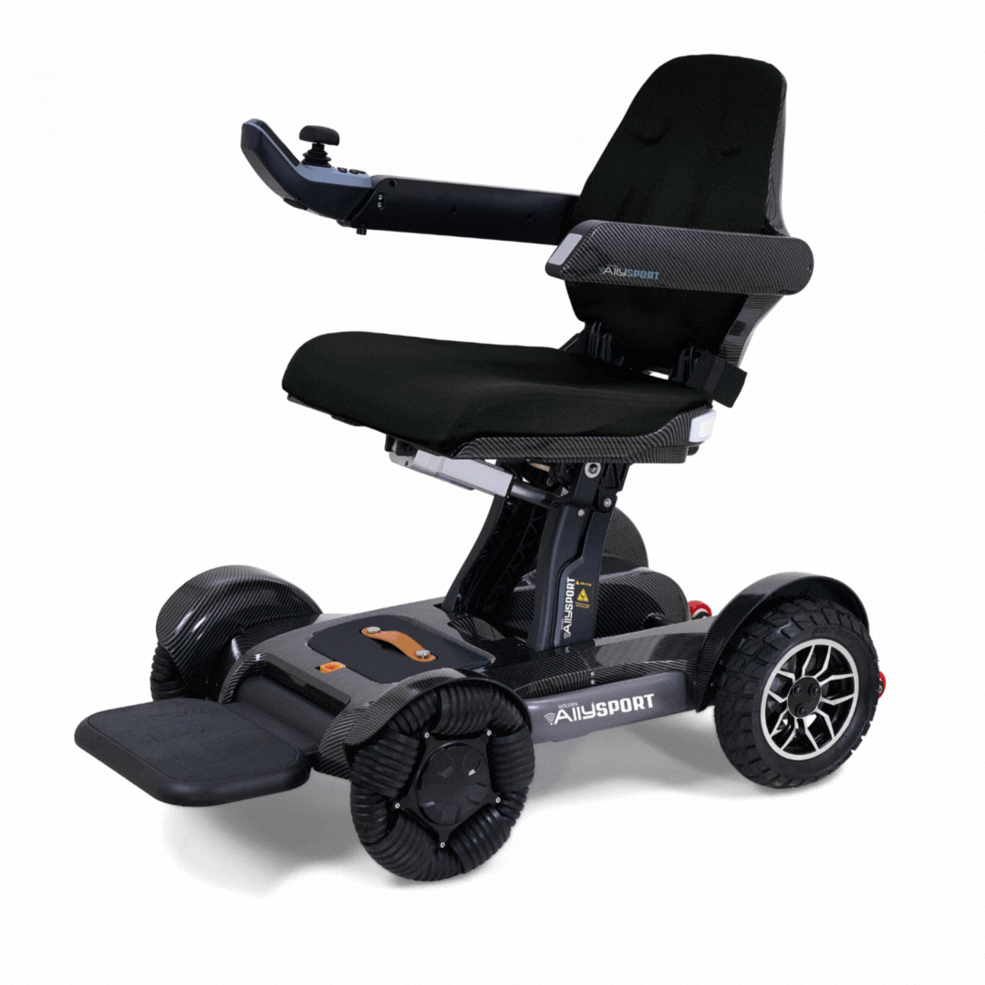 The Golden Tech Ally Sport Smart Powerchair features four omni-directional wheels, app control, armrests, a right-side joystick, and a compact black frame with visible AllySport branding for comfortable mobility.
